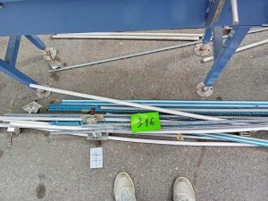 Autre Un convoyeur motorisé à chaines et à rouleaux, NATEL INTERNATIONAL. Dimensions?  264